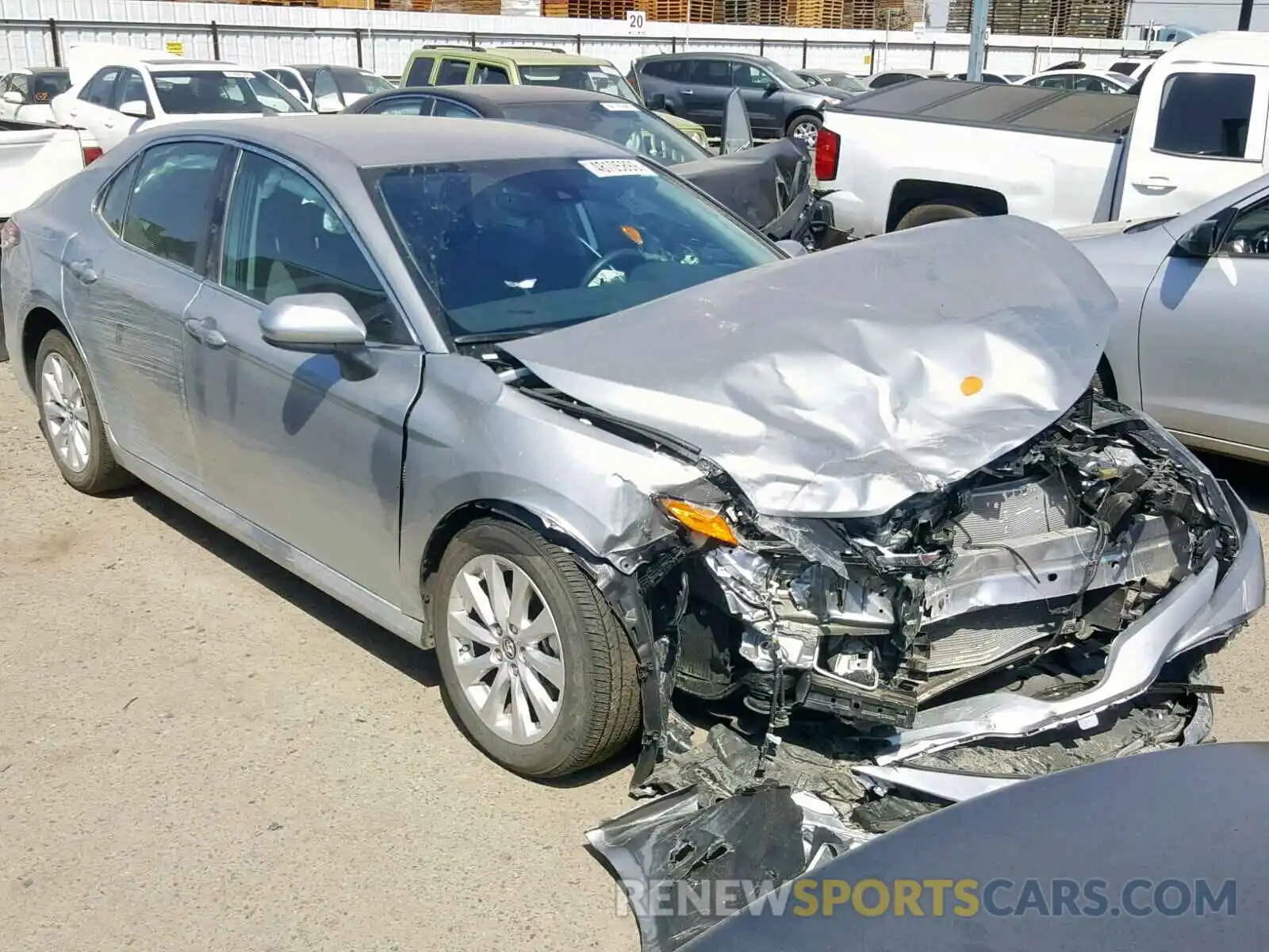 1 Photograph of a damaged car 4T1B11HK0KU785645 TOYOTA CAMRY 2019