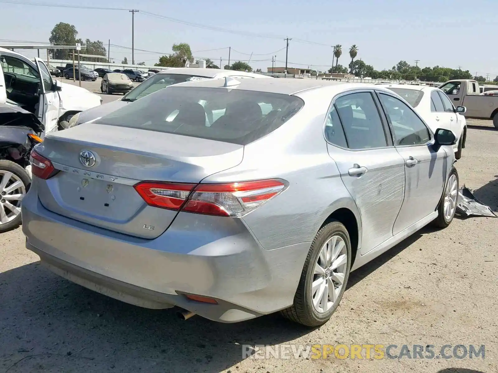 4 Photograph of a damaged car 4T1B11HK0KU785645 TOYOTA CAMRY 2019