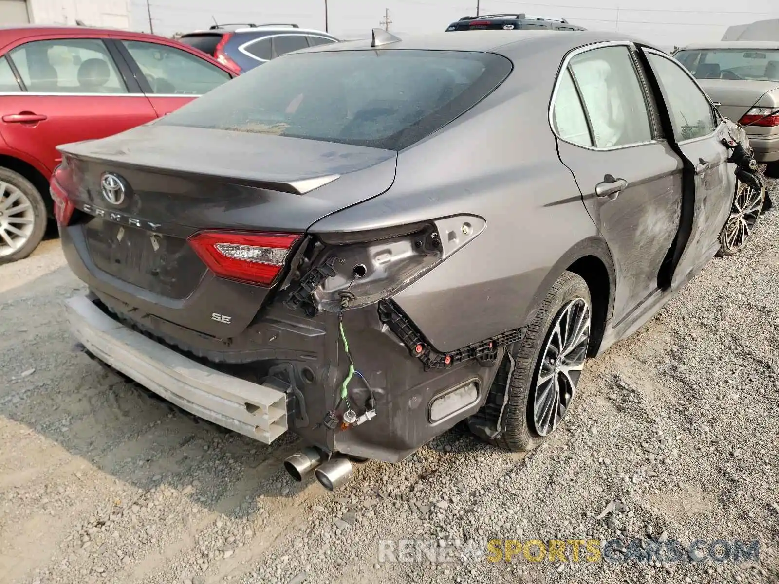 4 Photograph of a damaged car 4T1B11HK0KU786374 TOYOTA CAMRY 2019