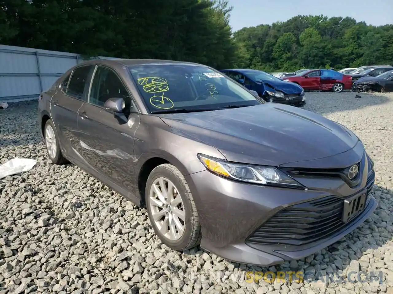 1 Photograph of a damaged car 4T1B11HK0KU790201 TOYOTA CAMRY 2019