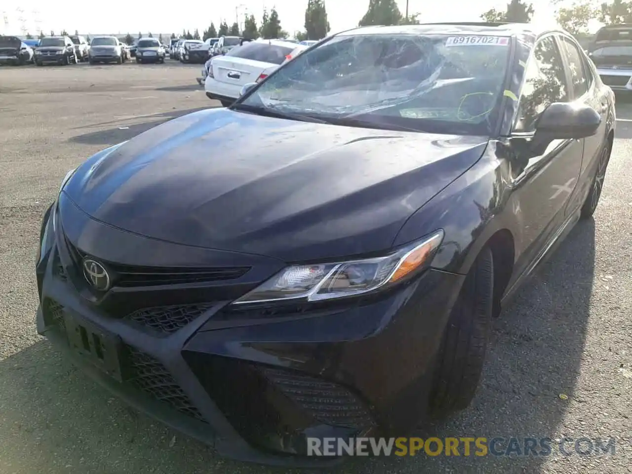 2 Photograph of a damaged car 4T1B11HK0KU790747 TOYOTA CAMRY 2019