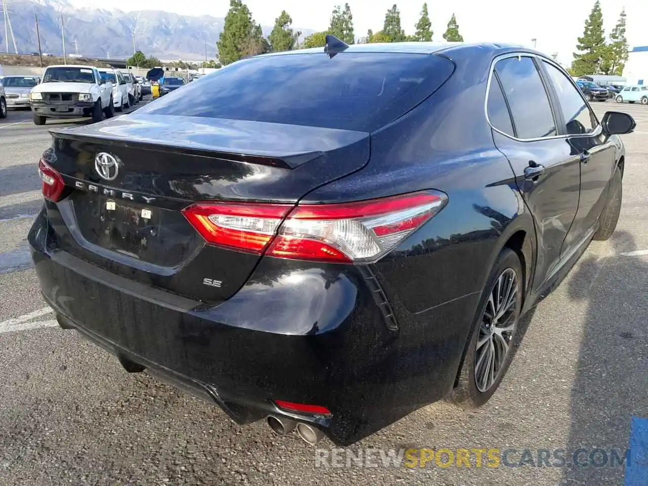 4 Photograph of a damaged car 4T1B11HK0KU790747 TOYOTA CAMRY 2019