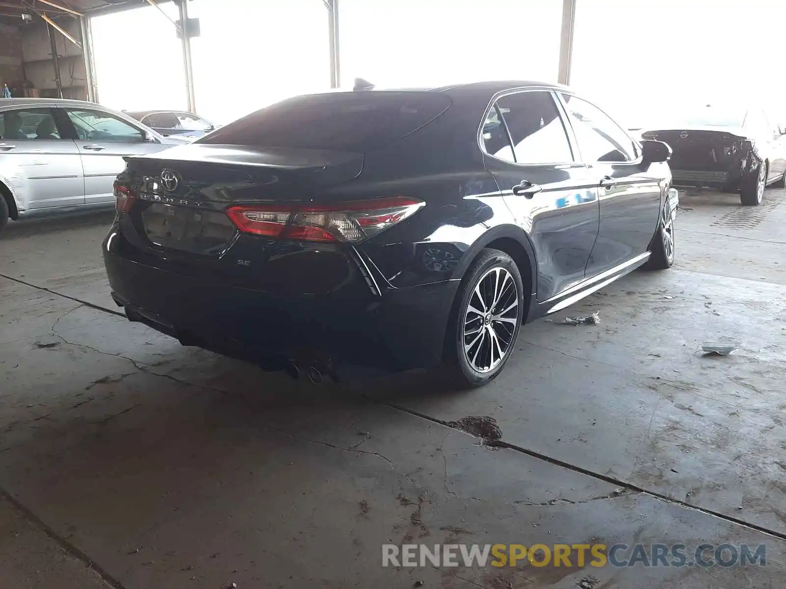 4 Photograph of a damaged car 4T1B11HK0KU792949 TOYOTA CAMRY 2019