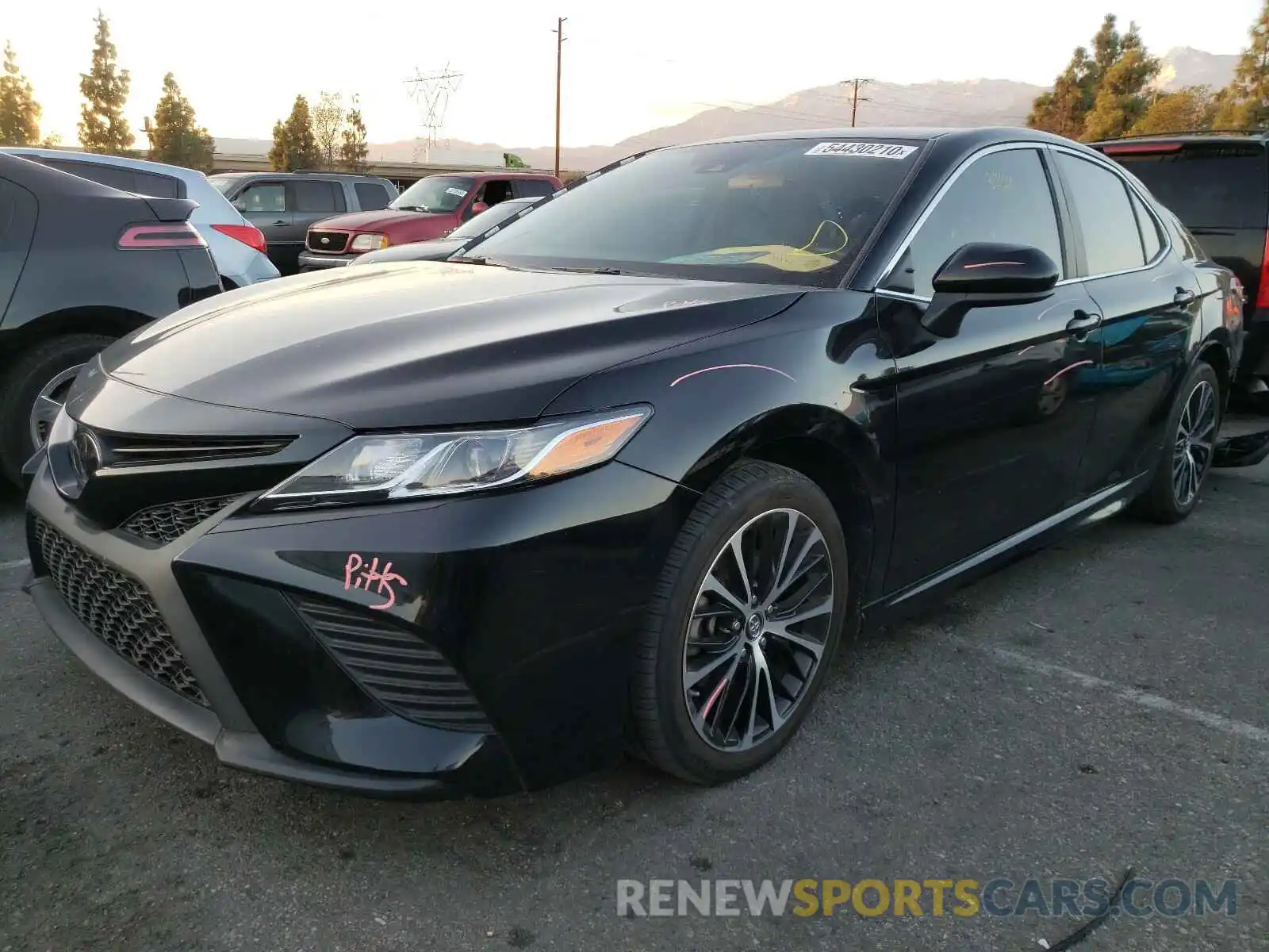 2 Photograph of a damaged car 4T1B11HK0KU800998 TOYOTA CAMRY 2019