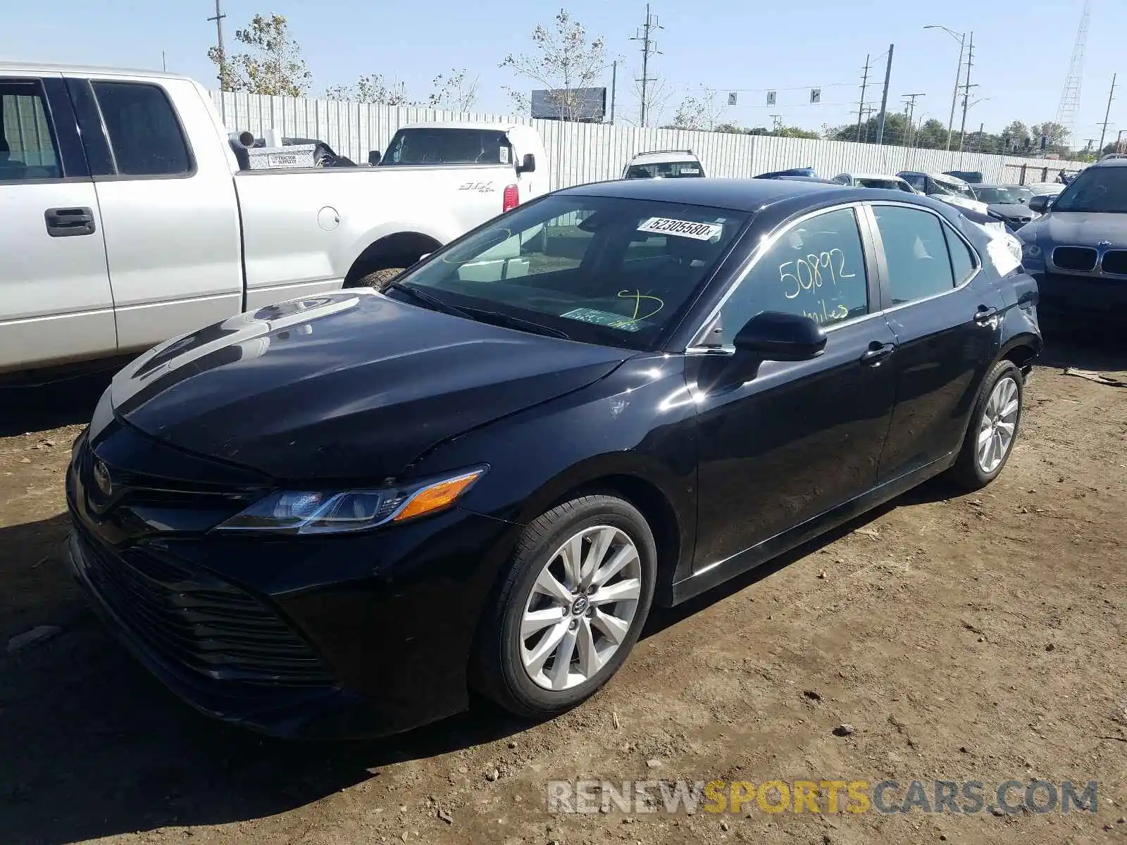 2 Photograph of a damaged car 4T1B11HK0KU802086 TOYOTA CAMRY 2019