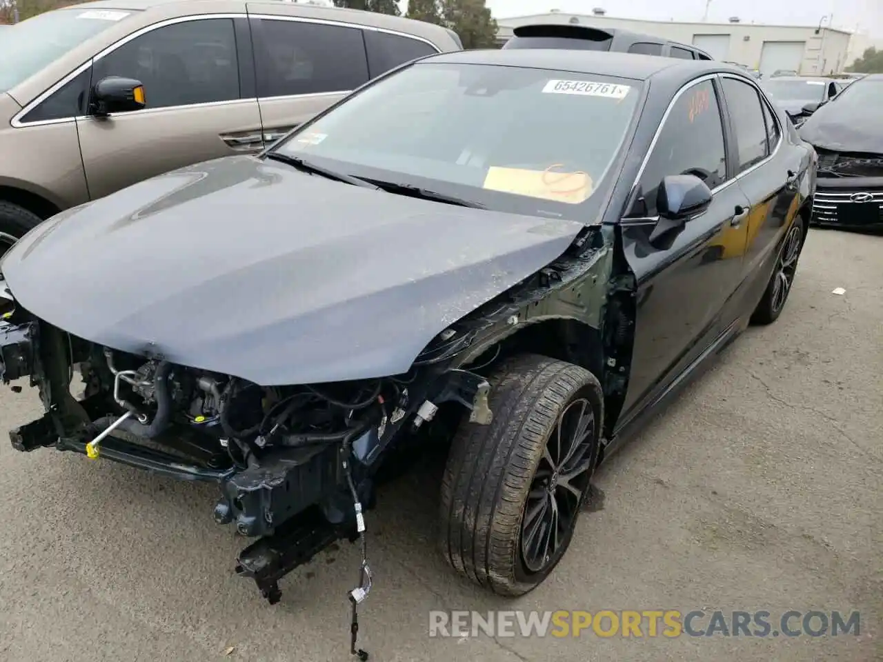 2 Photograph of a damaged car 4T1B11HK0KU803237 TOYOTA CAMRY 2019