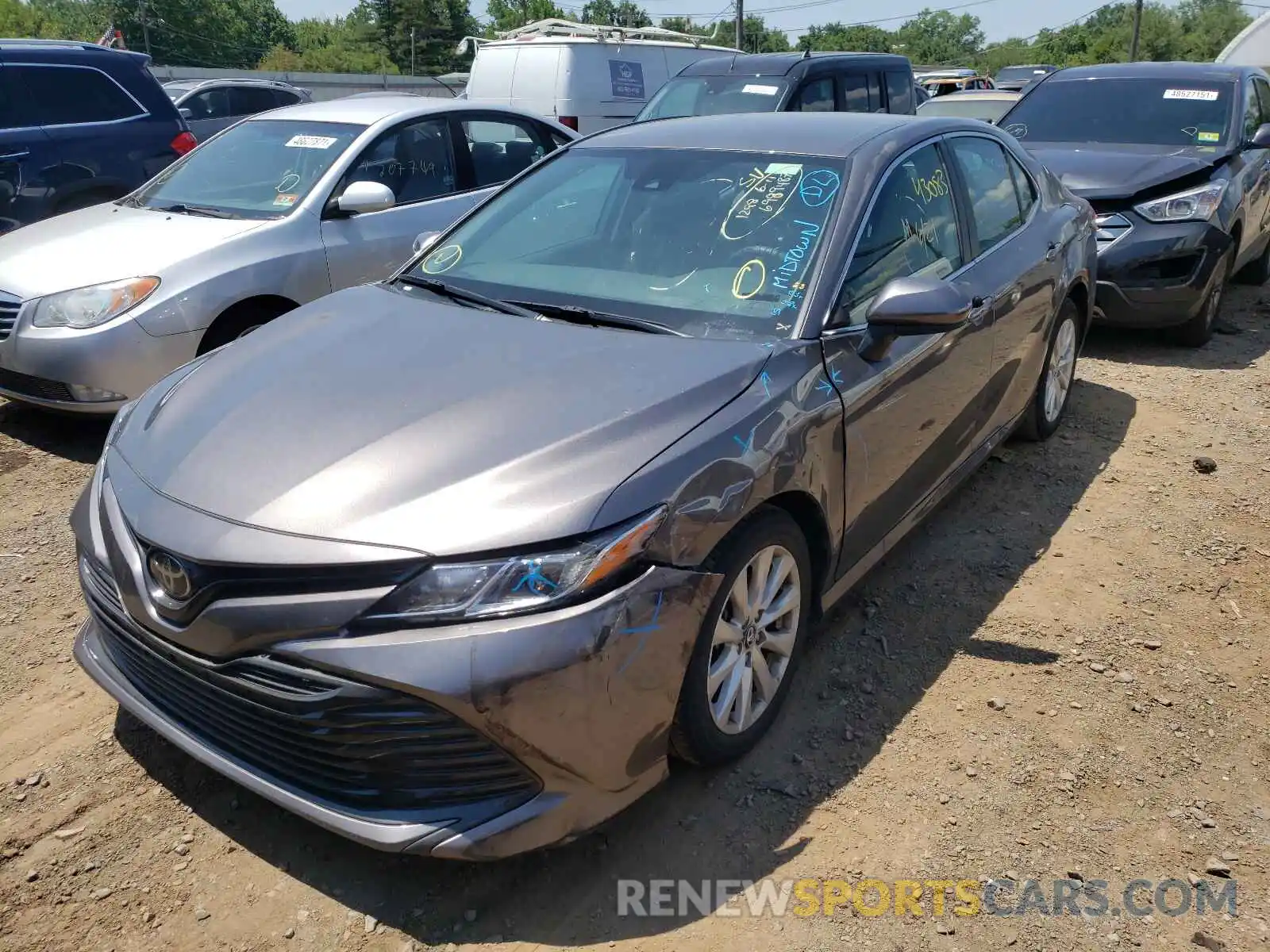 2 Photograph of a damaged car 4T1B11HK0KU804260 TOYOTA CAMRY 2019