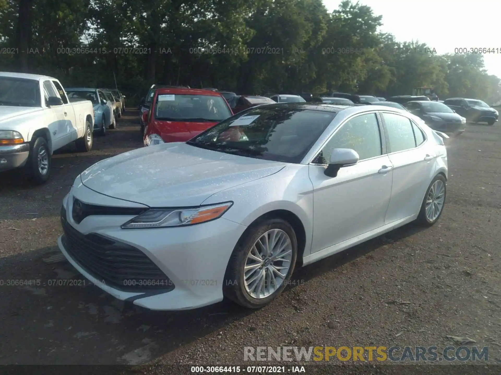 2 Photograph of a damaged car 4T1B11HK0KU809152 TOYOTA CAMRY 2019