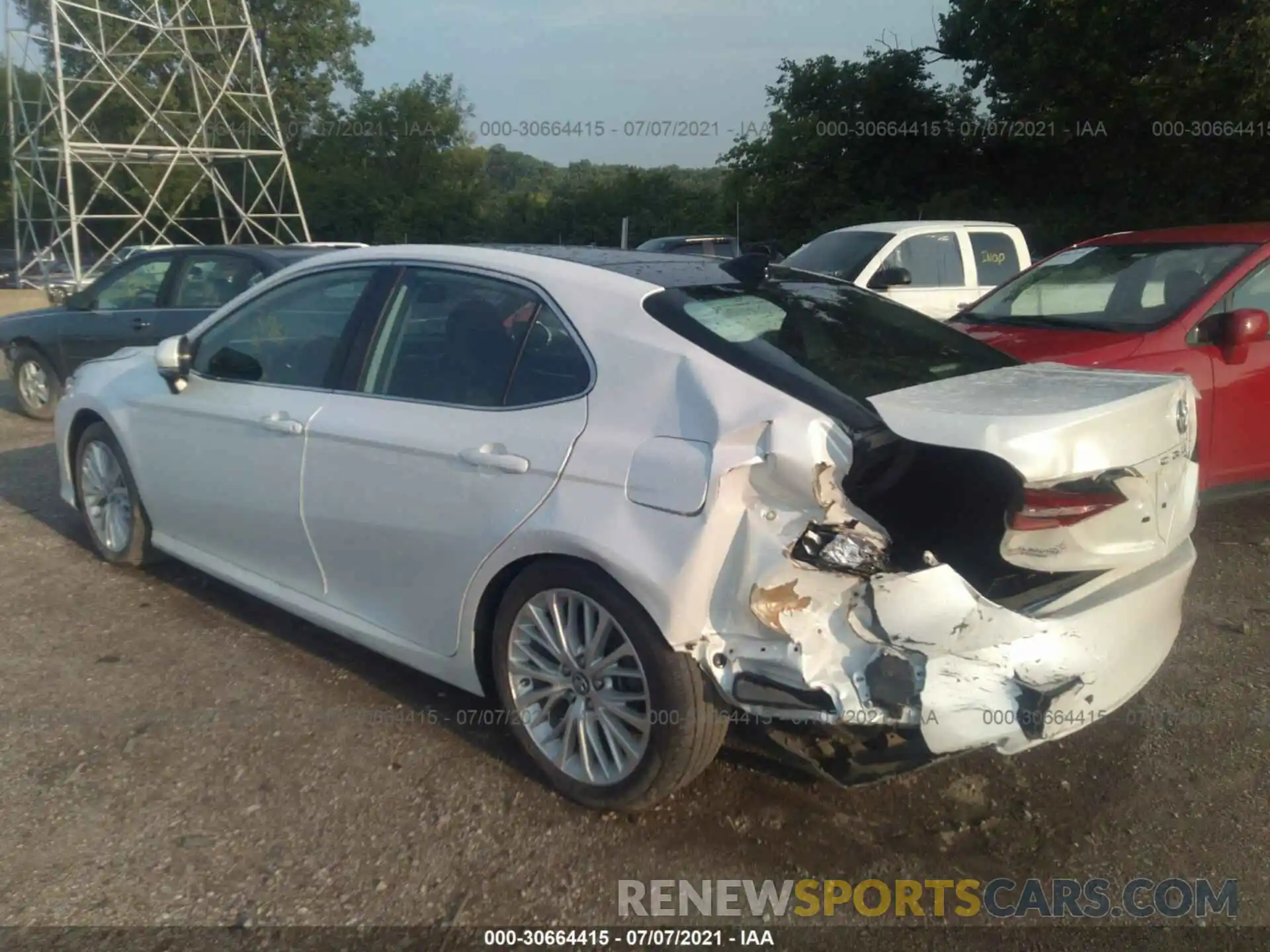 3 Photograph of a damaged car 4T1B11HK0KU809152 TOYOTA CAMRY 2019