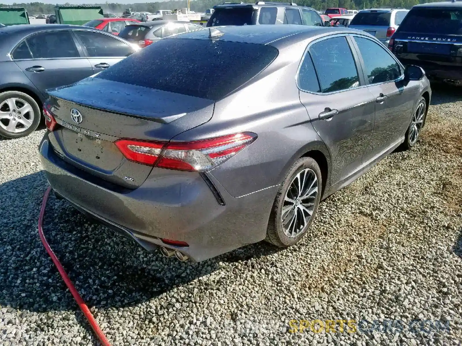 4 Photograph of a damaged car 4T1B11HK0KU810981 TOYOTA CAMRY 2019