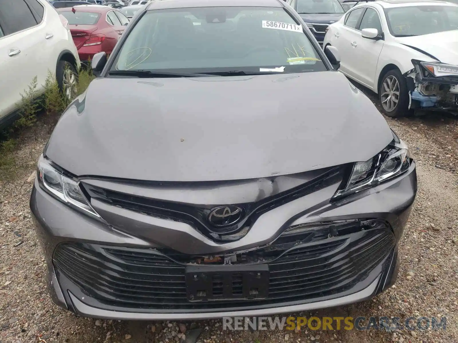 7 Photograph of a damaged car 4T1B11HK0KU811077 TOYOTA CAMRY 2019