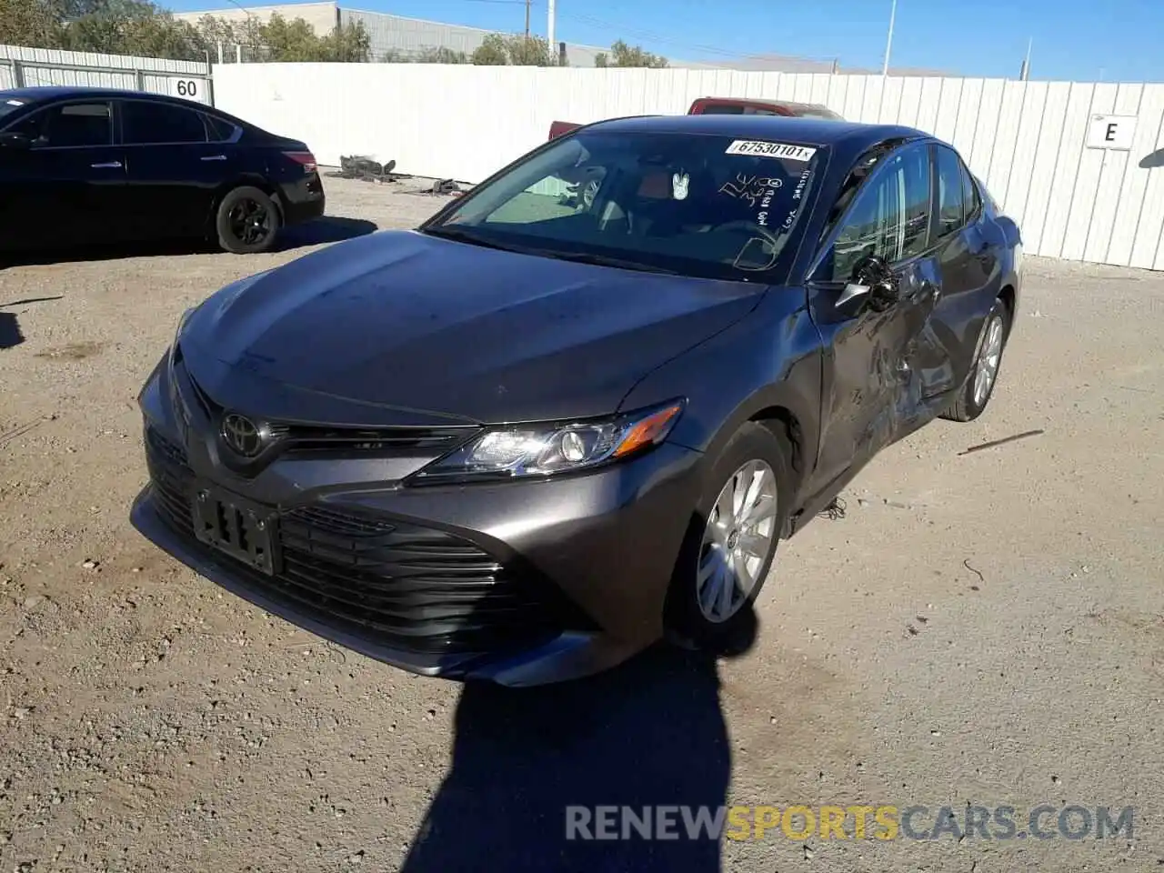 2 Photograph of a damaged car 4T1B11HK0KU813184 TOYOTA CAMRY 2019