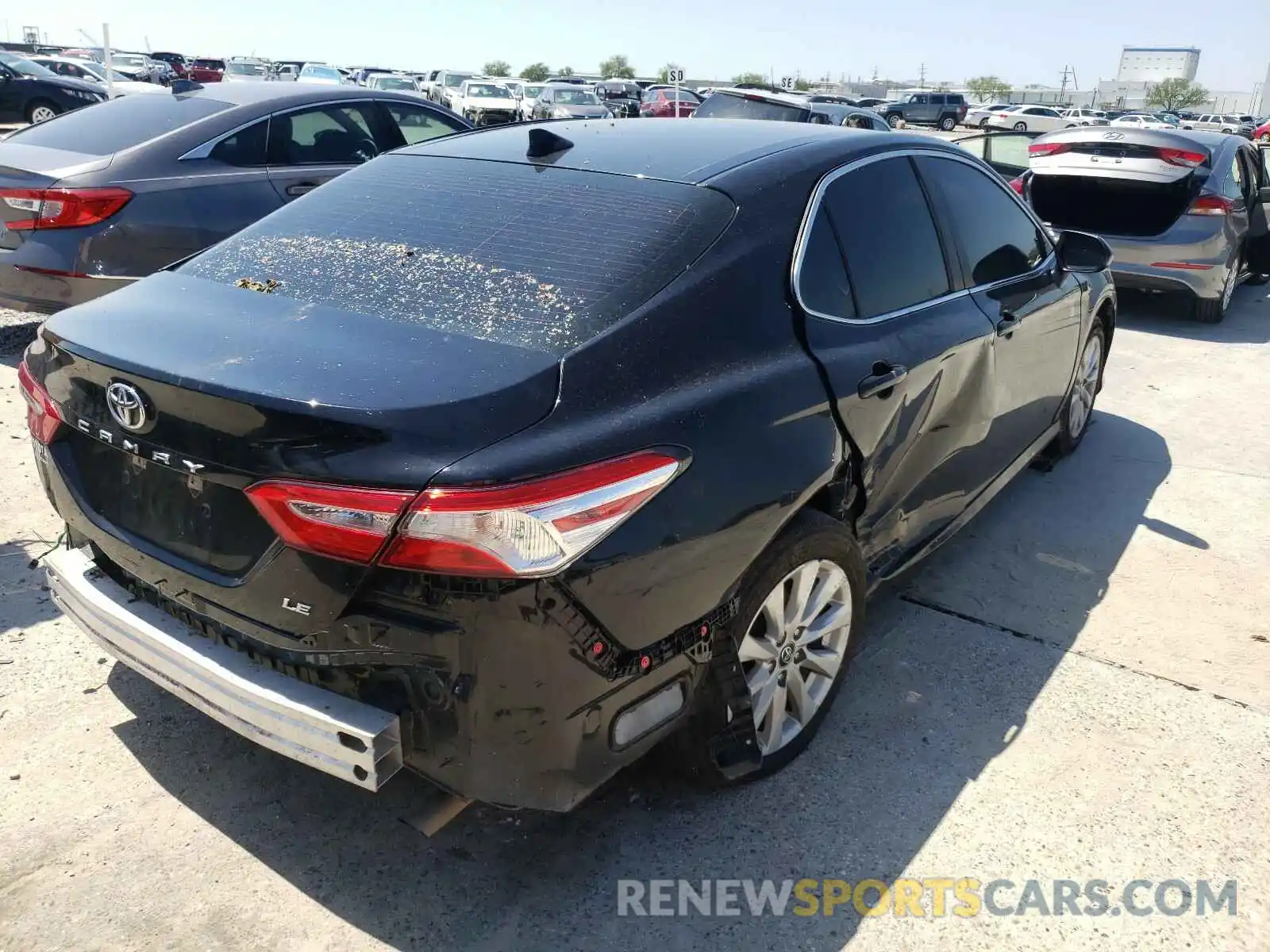 4 Photograph of a damaged car 4T1B11HK0KU822967 TOYOTA CAMRY 2019