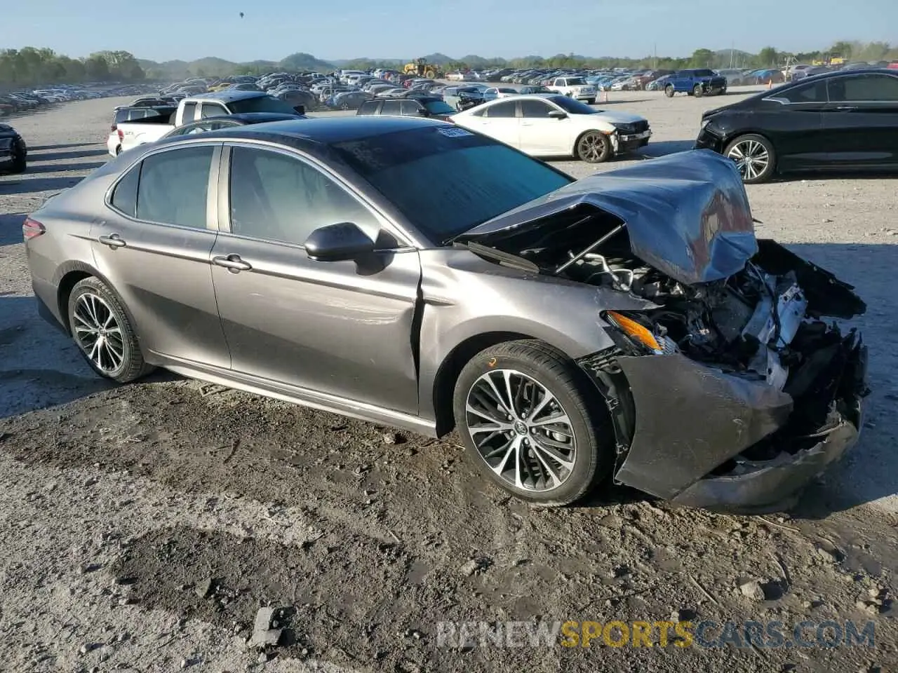 4 Photograph of a damaged car 4T1B11HK0KU823889 TOYOTA CAMRY 2019