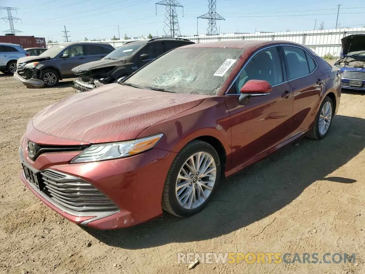 1 Photograph of a damaged car 4T1B11HK0KU824301 TOYOTA CAMRY 2019