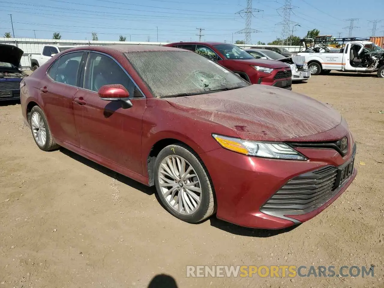 4 Photograph of a damaged car 4T1B11HK0KU824301 TOYOTA CAMRY 2019