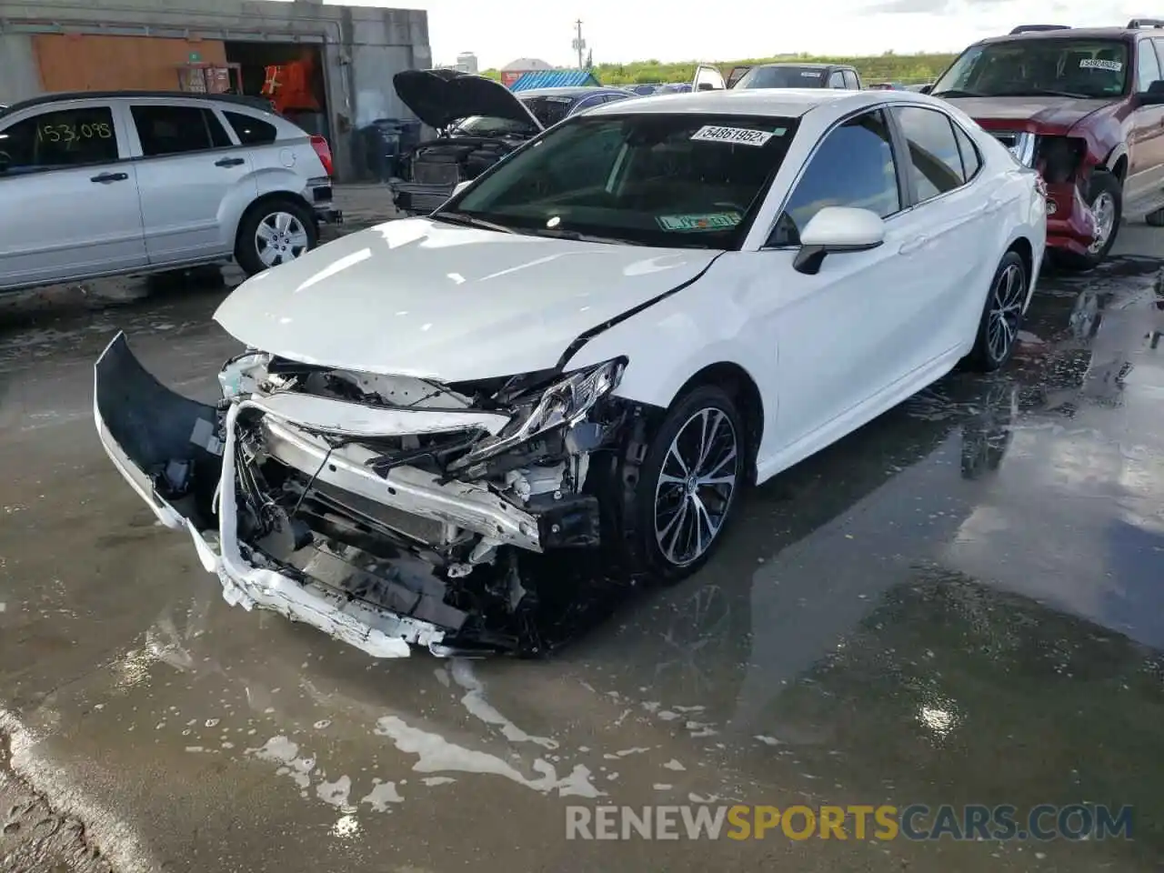 2 Photograph of a damaged car 4T1B11HK0KU825514 TOYOTA CAMRY 2019