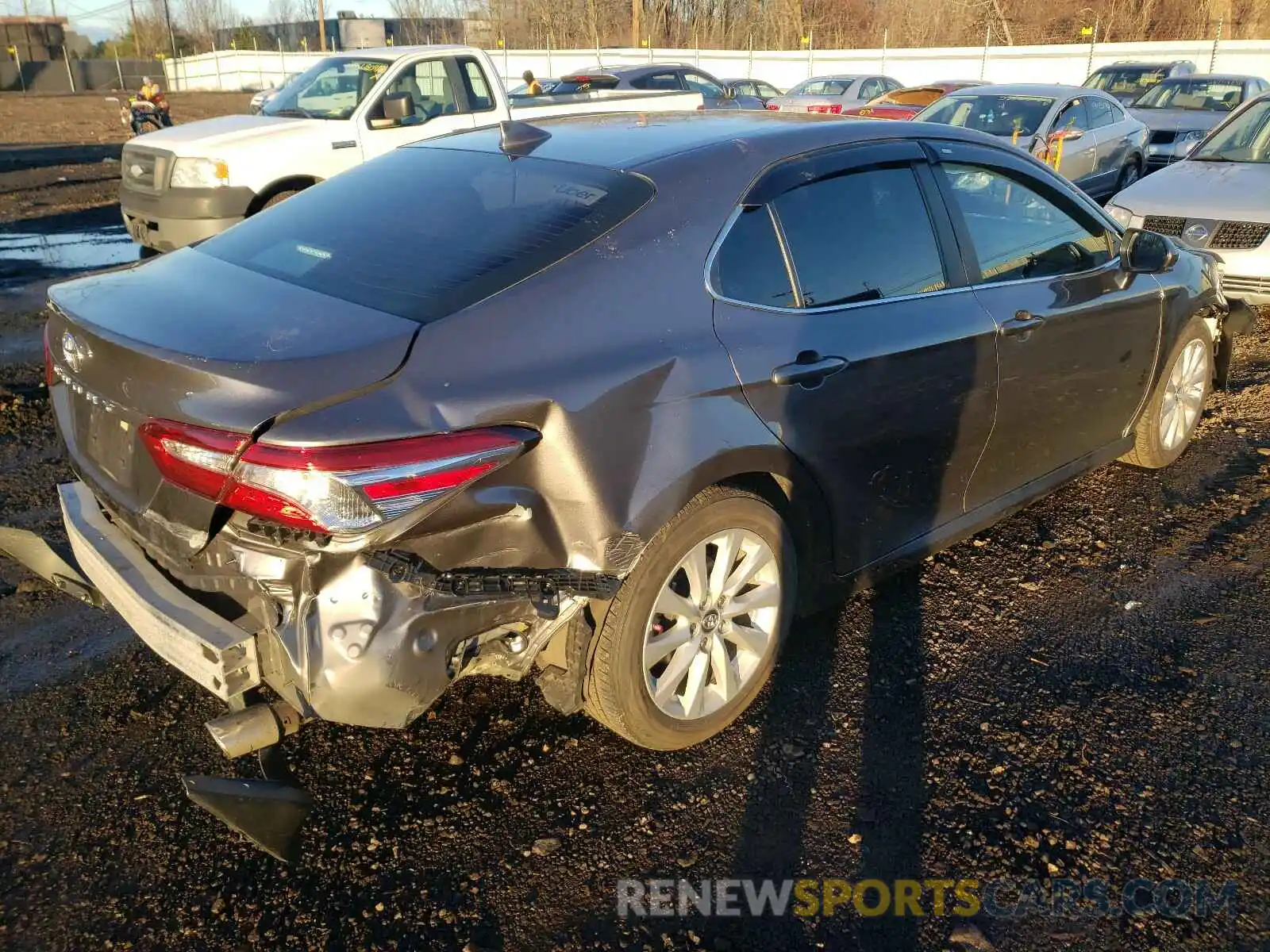 4 Photograph of a damaged car 4T1B11HK0KU839493 TOYOTA CAMRY 2019