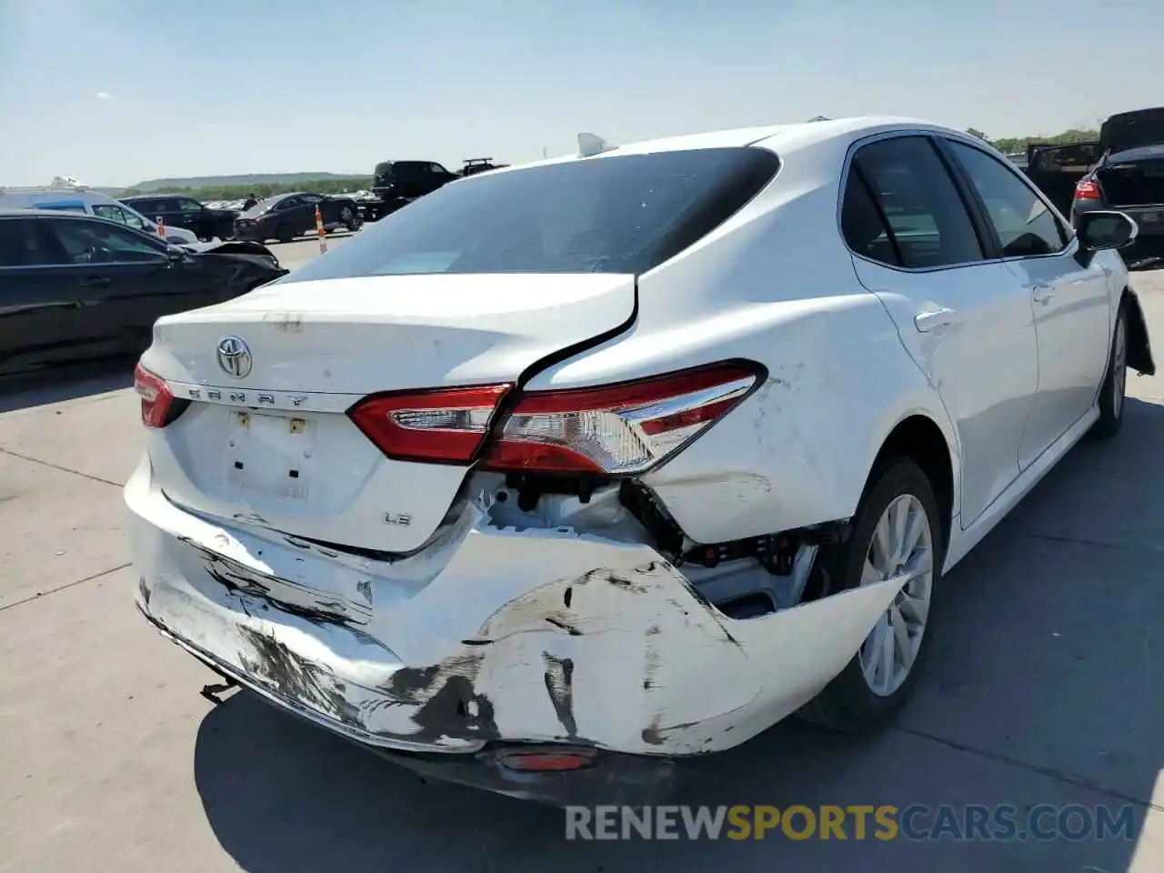 4 Photograph of a damaged car 4T1B11HK0KU856620 TOYOTA CAMRY 2019