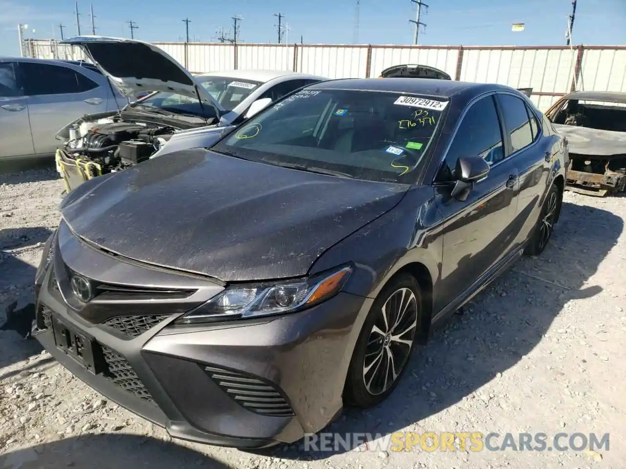 2 Photograph of a damaged car 4T1B11HK1KU176371 TOYOTA CAMRY 2019