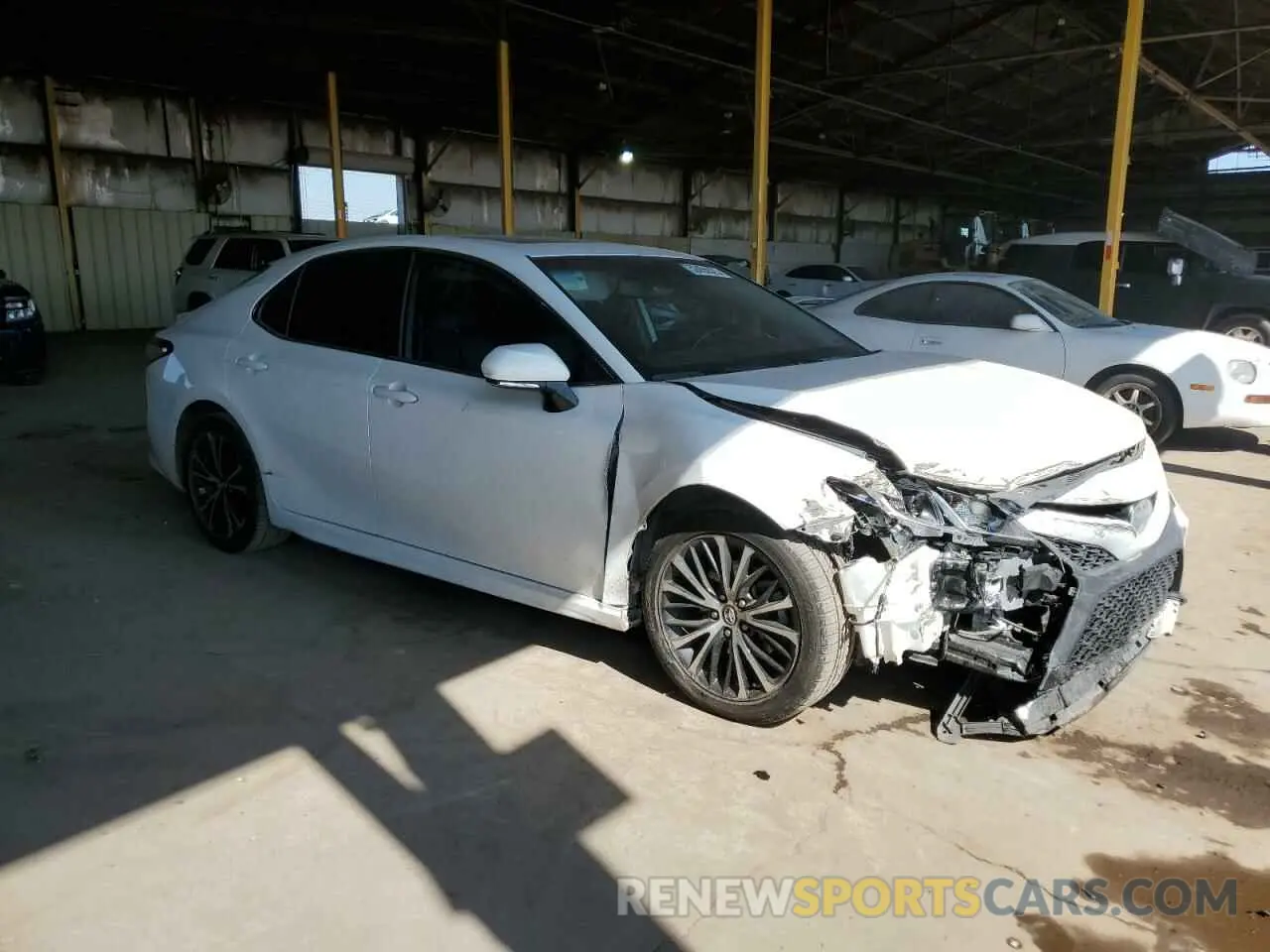4 Photograph of a damaged car 4T1B11HK1KU186205 TOYOTA CAMRY 2019