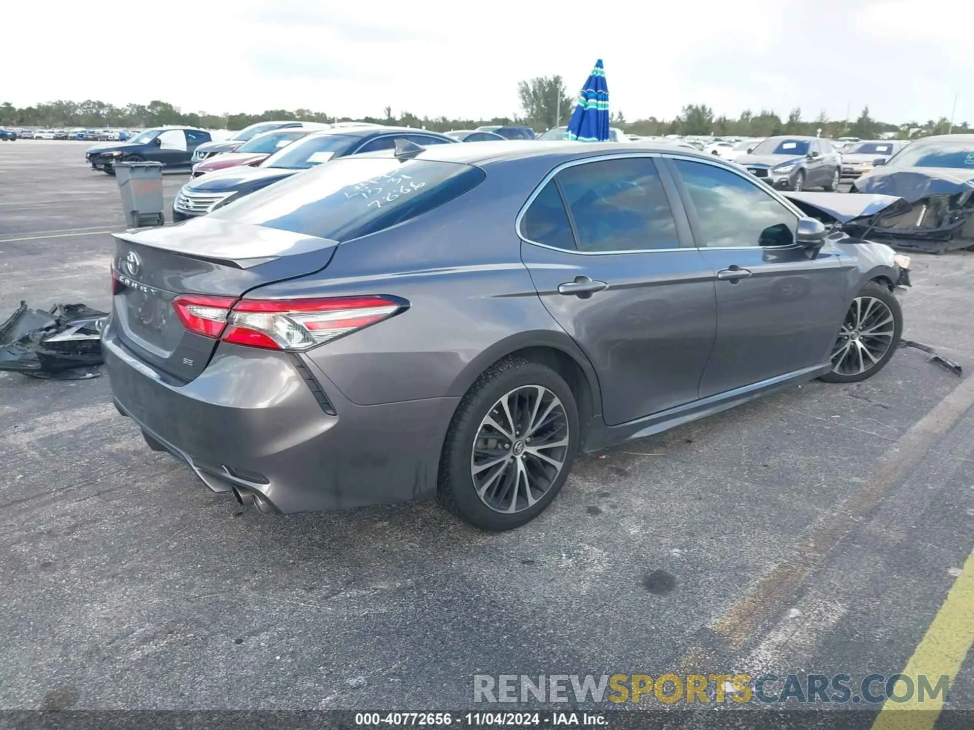 4 Photograph of a damaged car 4T1B11HK1KU187886 TOYOTA CAMRY 2019