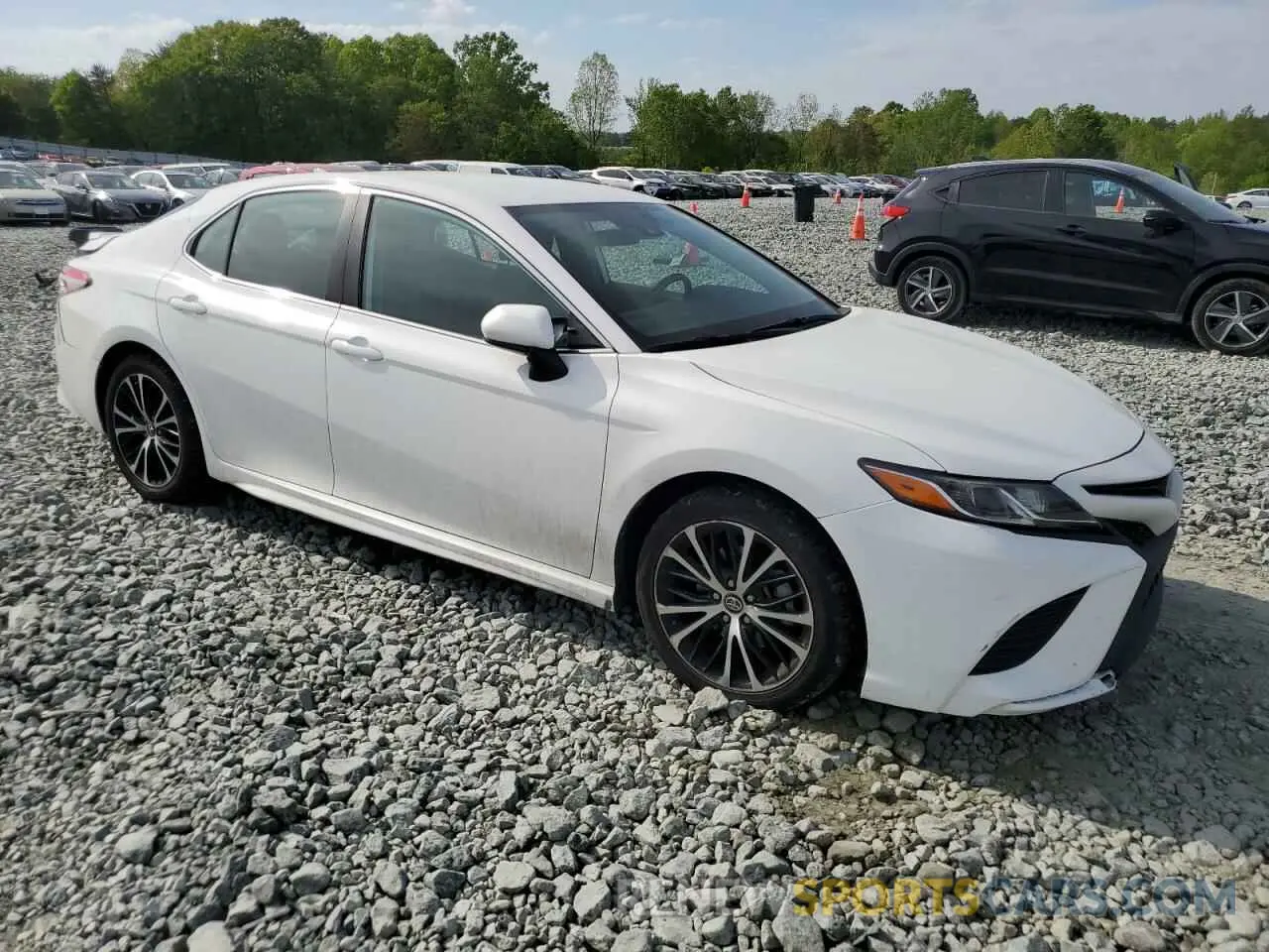 4 Photograph of a damaged car 4T1B11HK1KU195857 TOYOTA CAMRY 2019