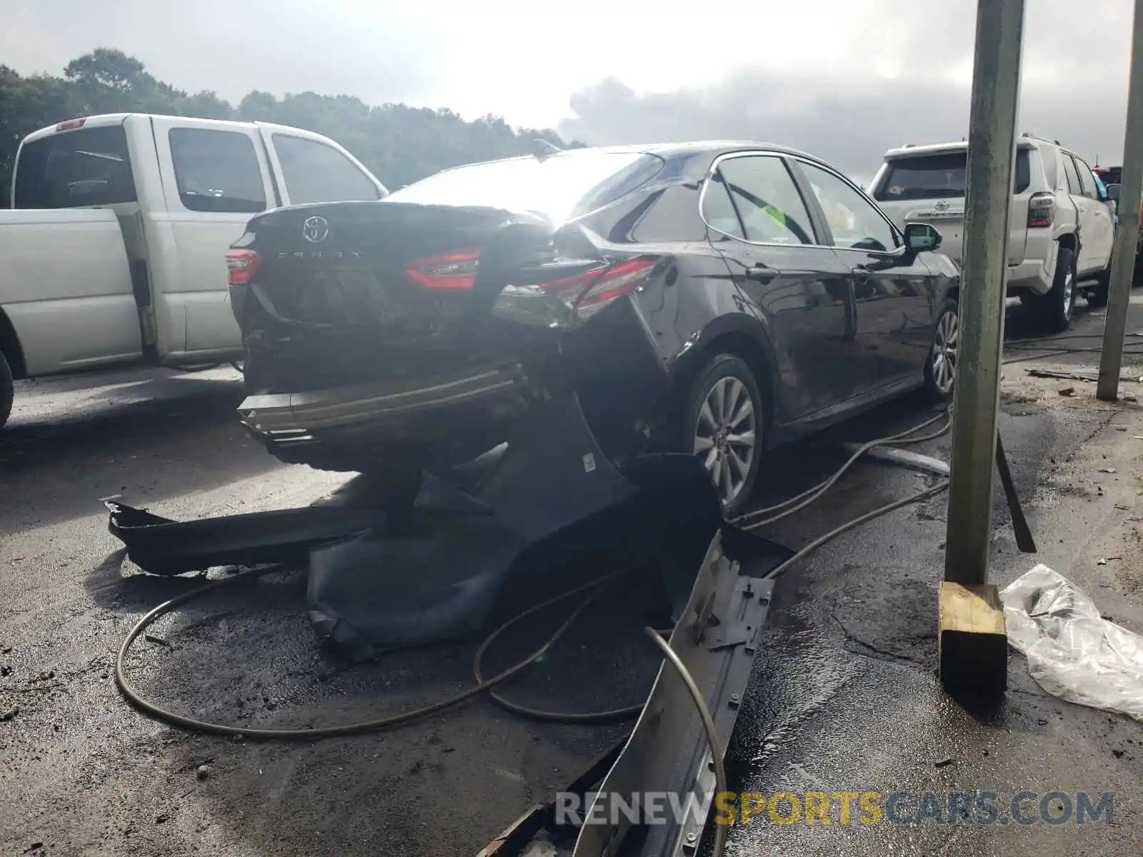 4 Photograph of a damaged car 4T1B11HK1KU198015 TOYOTA CAMRY 2019