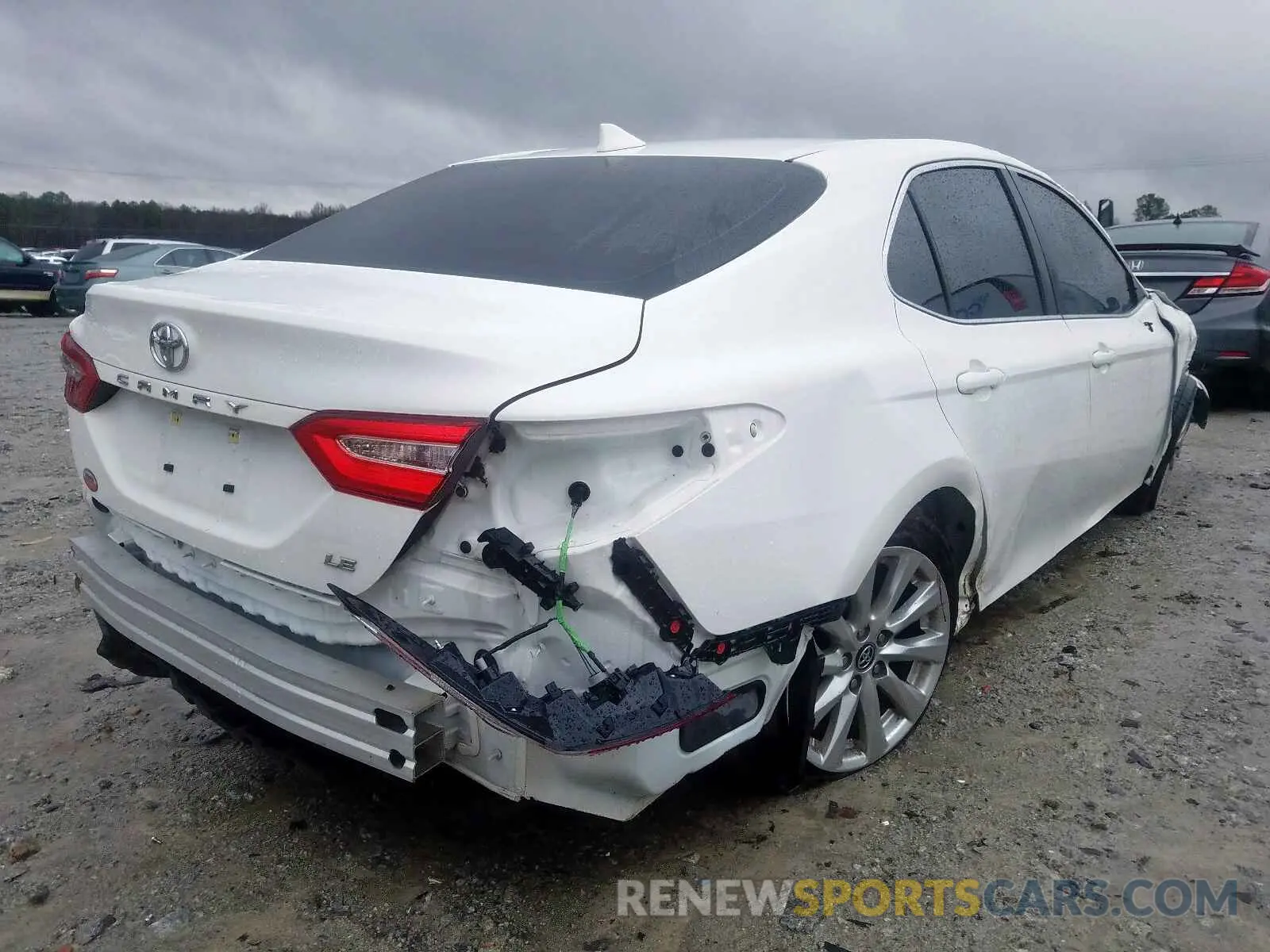 4 Photograph of a damaged car 4T1B11HK1KU201561 TOYOTA CAMRY 2019
