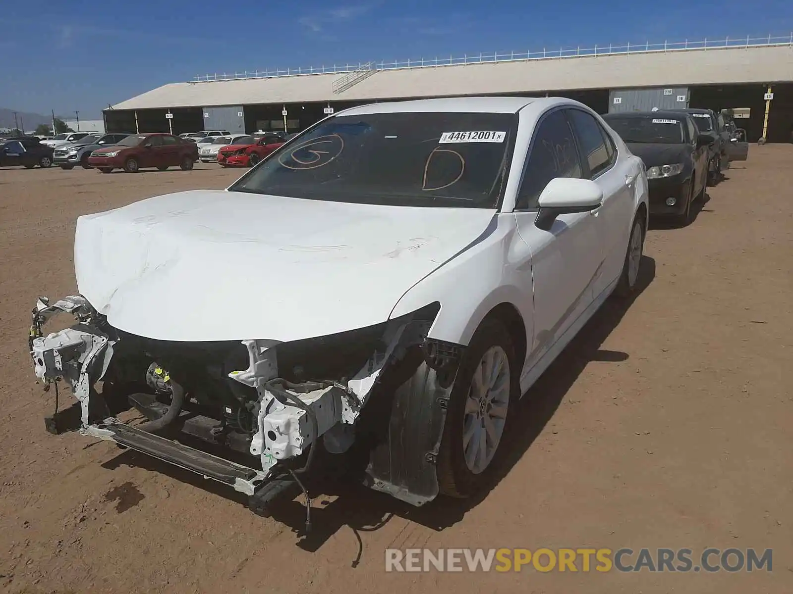 2 Photograph of a damaged car 4T1B11HK1KU205951 TOYOTA CAMRY 2019