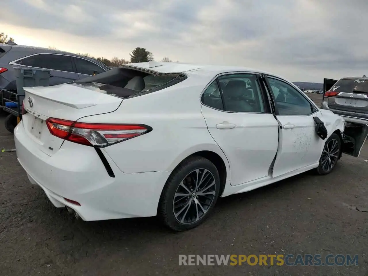 3 Photograph of a damaged car 4T1B11HK1KU214732 TOYOTA CAMRY 2019