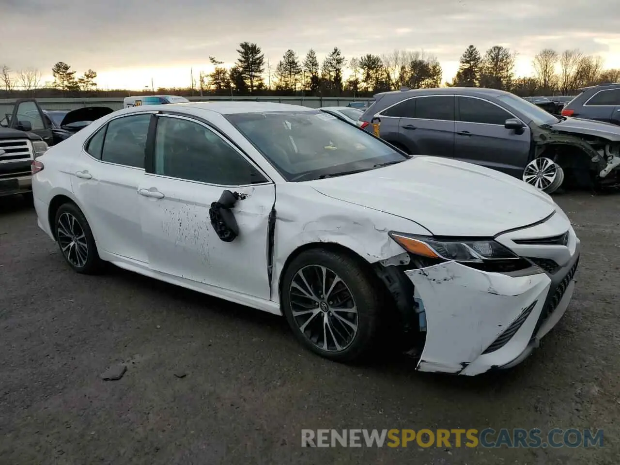 4 Photograph of a damaged car 4T1B11HK1KU214732 TOYOTA CAMRY 2019