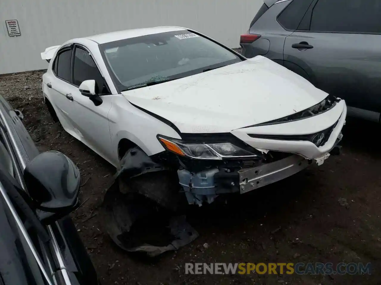 4 Photograph of a damaged car 4T1B11HK1KU215900 TOYOTA CAMRY 2019