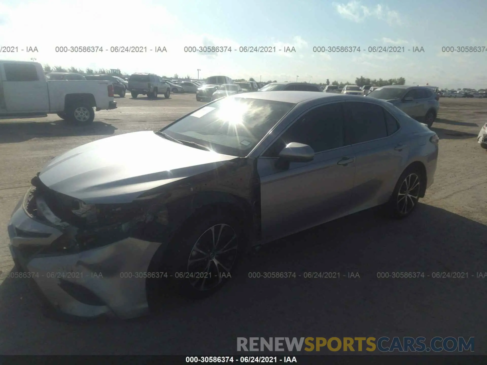 2 Photograph of a damaged car 4T1B11HK1KU221096 TOYOTA CAMRY 2019