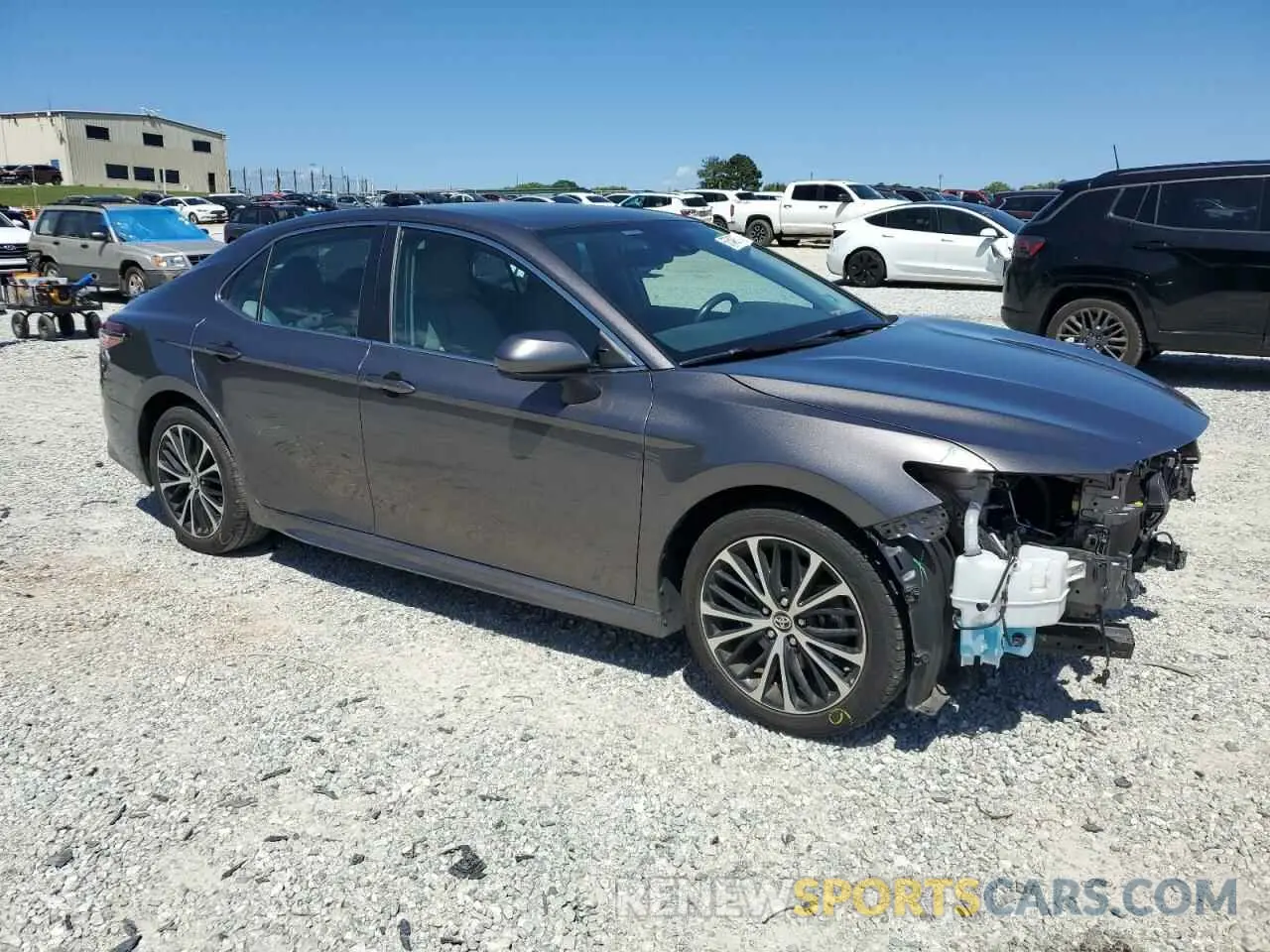 4 Photograph of a damaged car 4T1B11HK1KU222927 TOYOTA CAMRY 2019