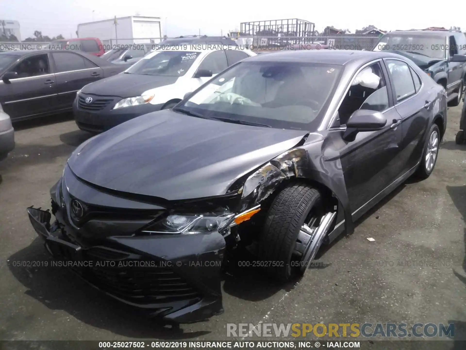 2 Photograph of a damaged car 4T1B11HK1KU231076 TOYOTA CAMRY 2019