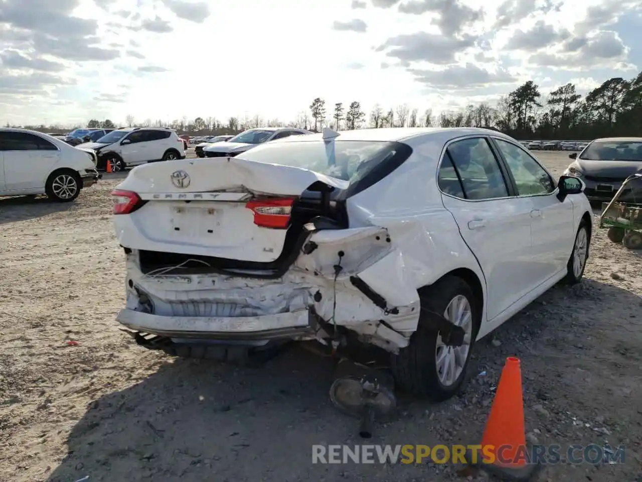 4 Photograph of a damaged car 4T1B11HK1KU239260 TOYOTA CAMRY 2019