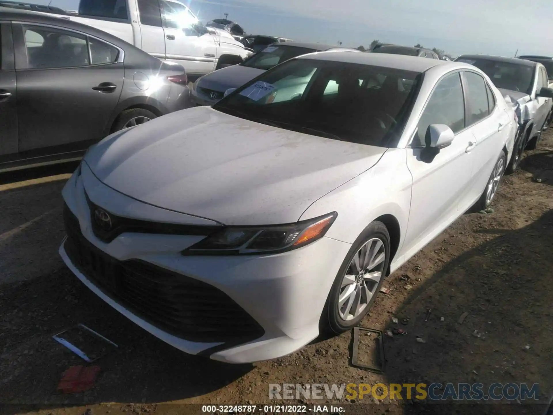 2 Photograph of a damaged car 4T1B11HK1KU239419 TOYOTA CAMRY 2019