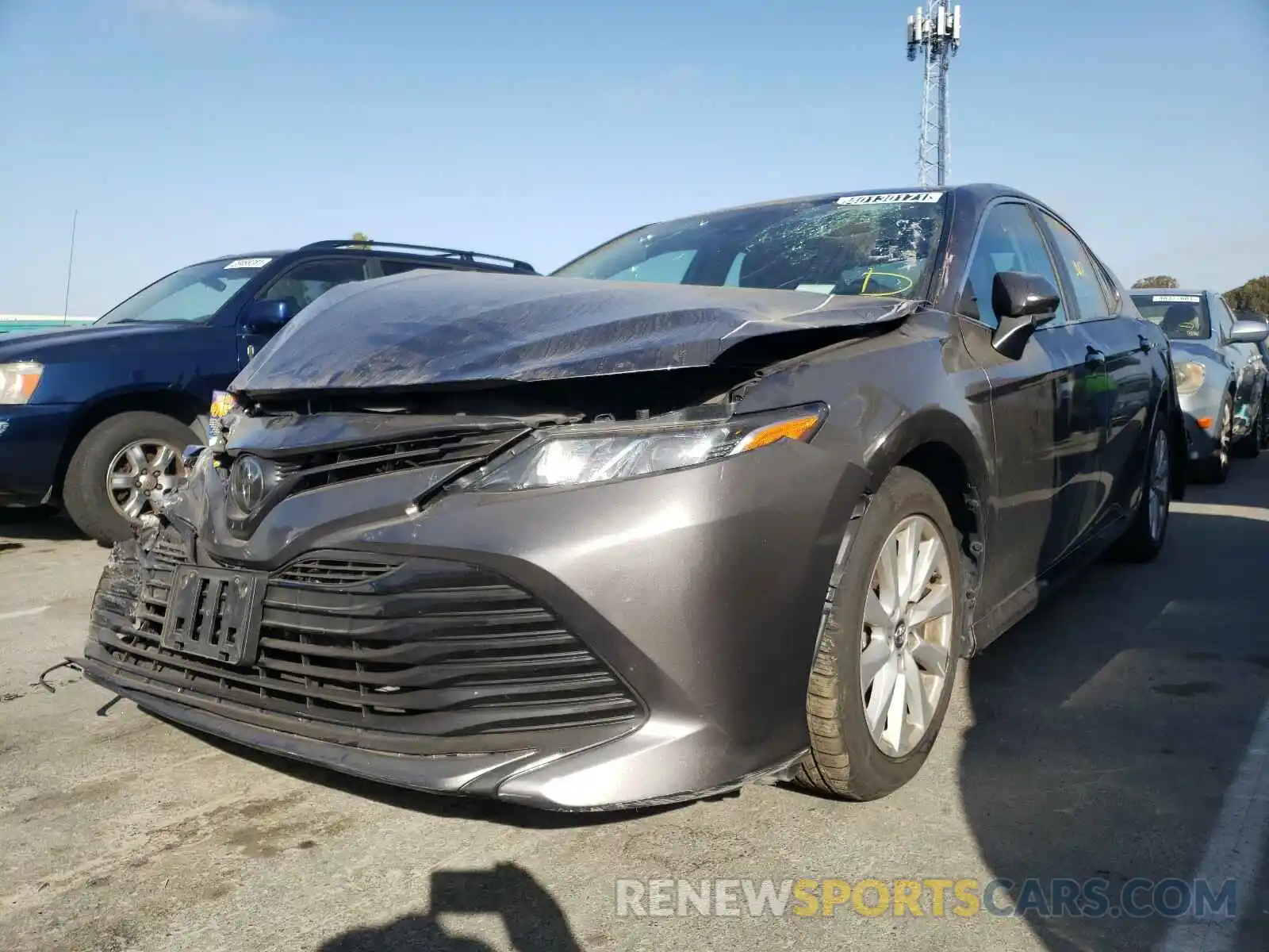 2 Photograph of a damaged car 4T1B11HK1KU243714 TOYOTA CAMRY 2019