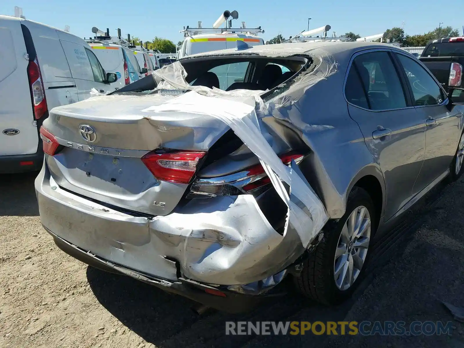 4 Photograph of a damaged car 4T1B11HK1KU252817 TOYOTA CAMRY 2019