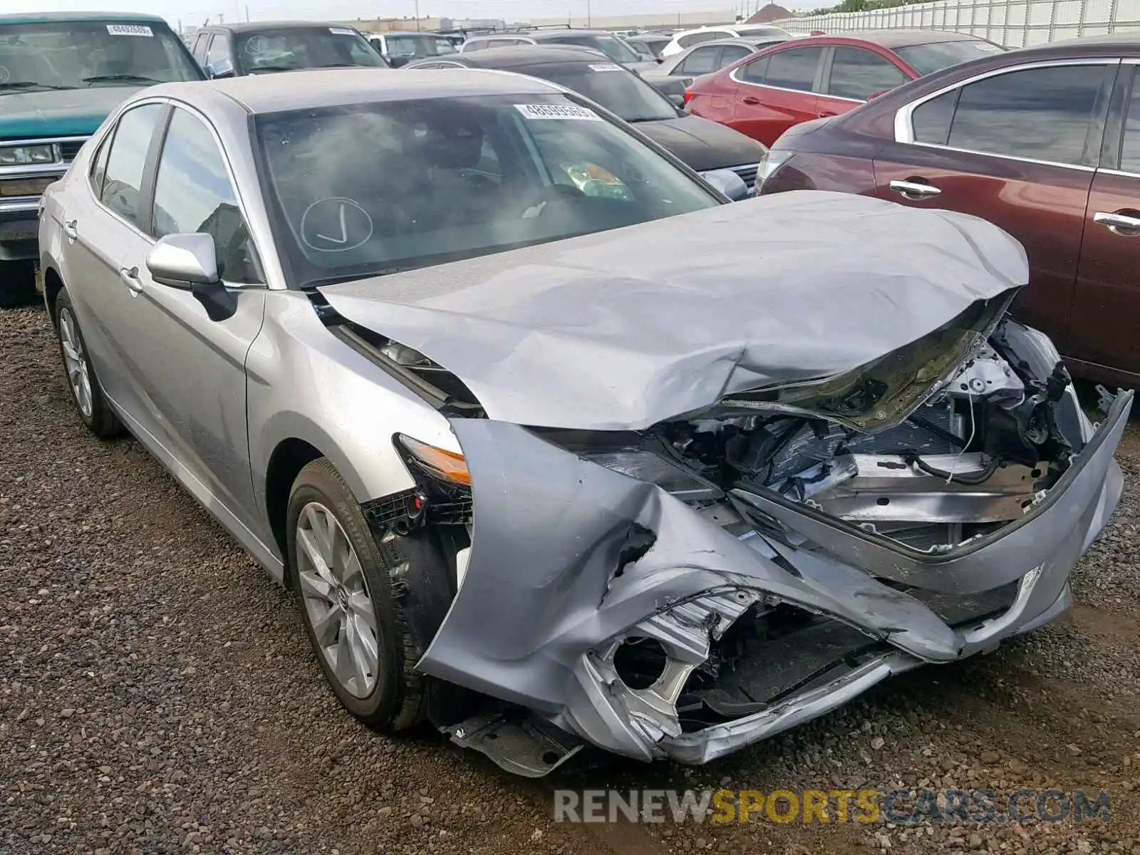 1 Photograph of a damaged car 4T1B11HK1KU254664 TOYOTA CAMRY 2019