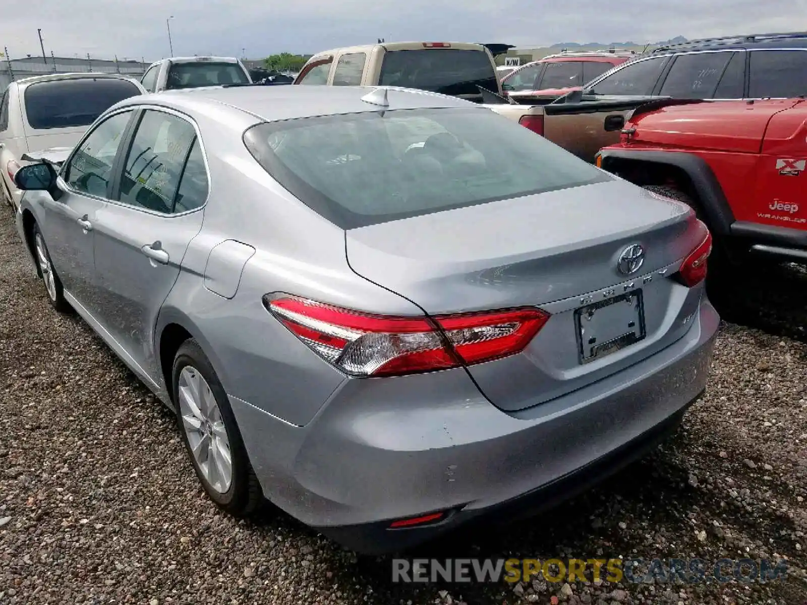 3 Photograph of a damaged car 4T1B11HK1KU254664 TOYOTA CAMRY 2019