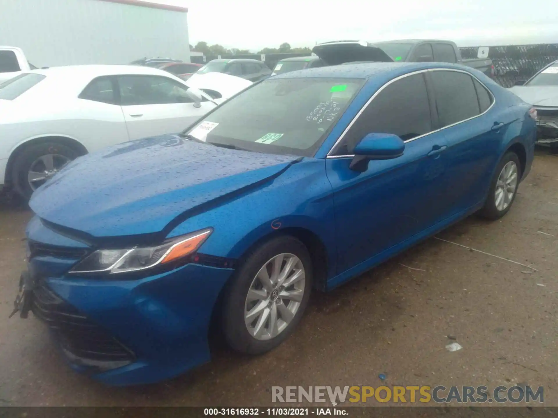 2 Photograph of a damaged car 4T1B11HK1KU256026 TOYOTA CAMRY 2019