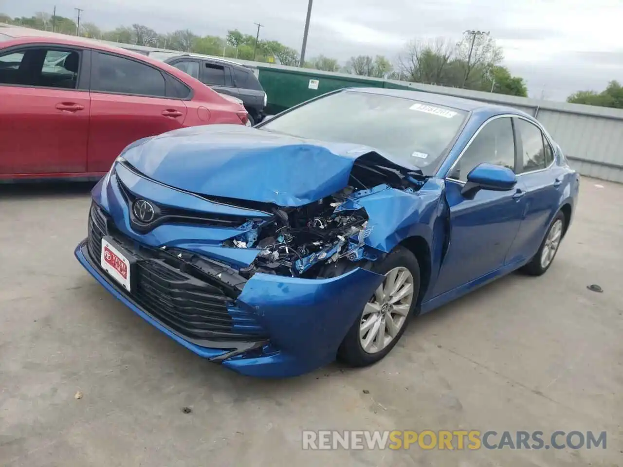 2 Photograph of a damaged car 4T1B11HK1KU264207 TOYOTA CAMRY 2019