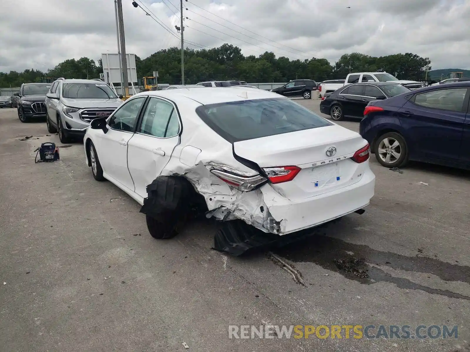 3 Photograph of a damaged car 4T1B11HK1KU264871 TOYOTA CAMRY 2019