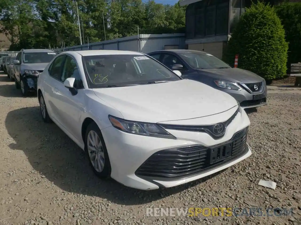 1 Photograph of a damaged car 4T1B11HK1KU270931 TOYOTA CAMRY 2019