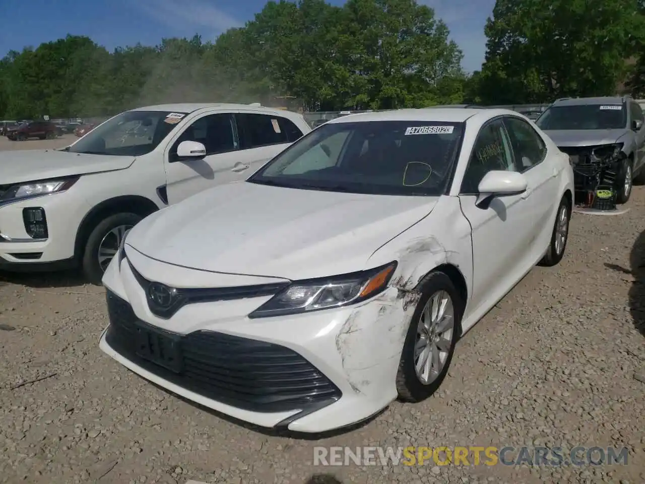 2 Photograph of a damaged car 4T1B11HK1KU270931 TOYOTA CAMRY 2019