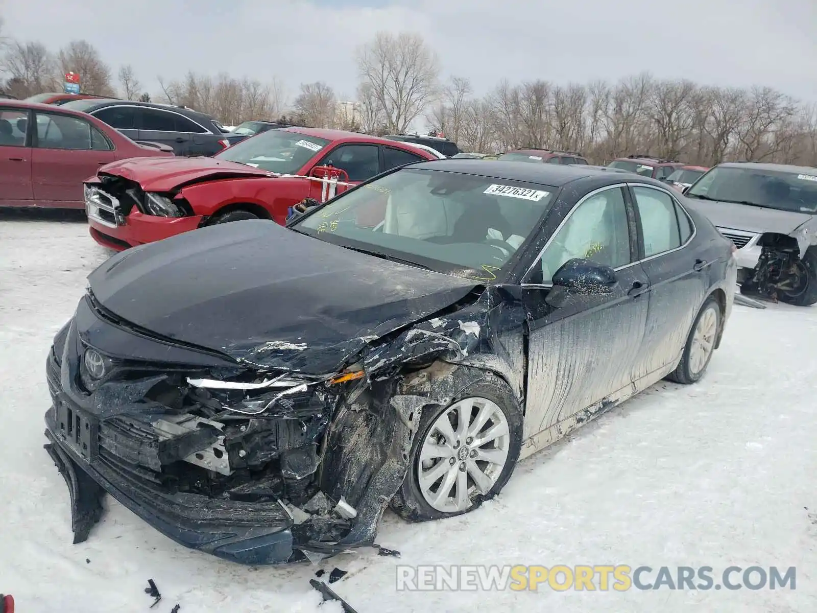 2 Photograph of a damaged car 4T1B11HK1KU282173 TOYOTA CAMRY 2019