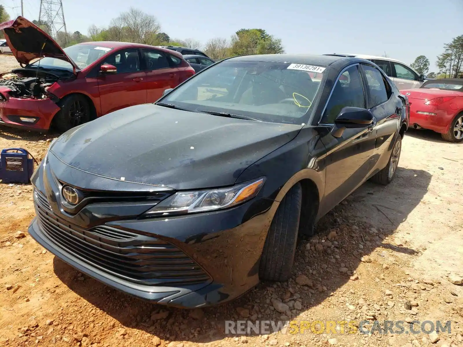 2 Photograph of a damaged car 4T1B11HK1KU283095 TOYOTA CAMRY 2019