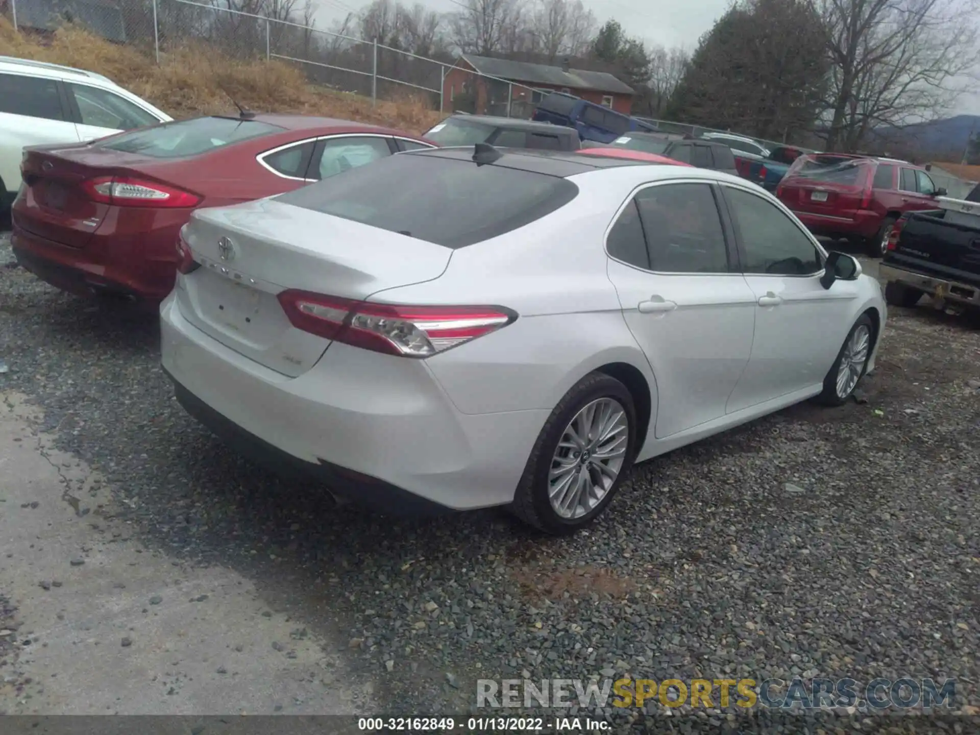 4 Photograph of a damaged car 4T1B11HK1KU297336 TOYOTA CAMRY 2019